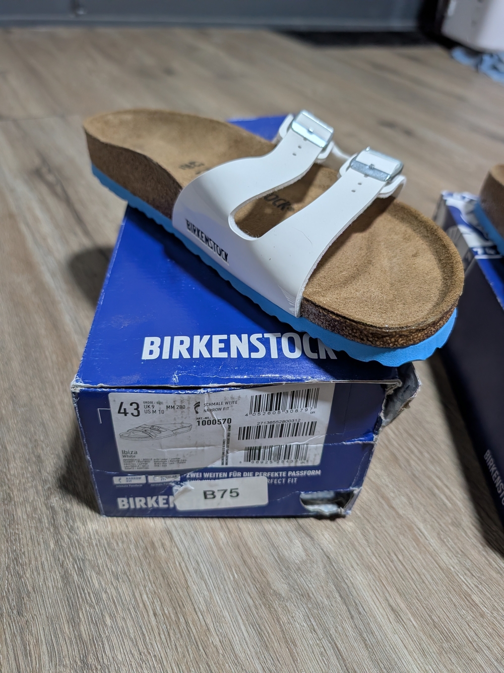 Birkenstock Women's White Sandal with Blue Outsole